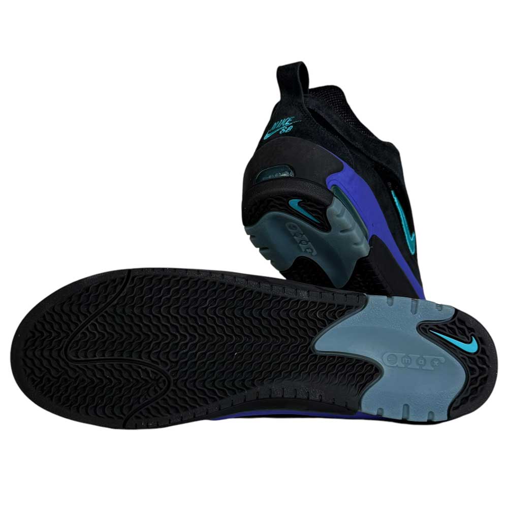 The FB2393-003 Dusty Cactus Black Air Max Ishod Wair Leather Suede Shoes feature teal and purple accents, visible Nike logos on the heel, side, and sole, plus Max Air cushioning and a detailed tread pattern.