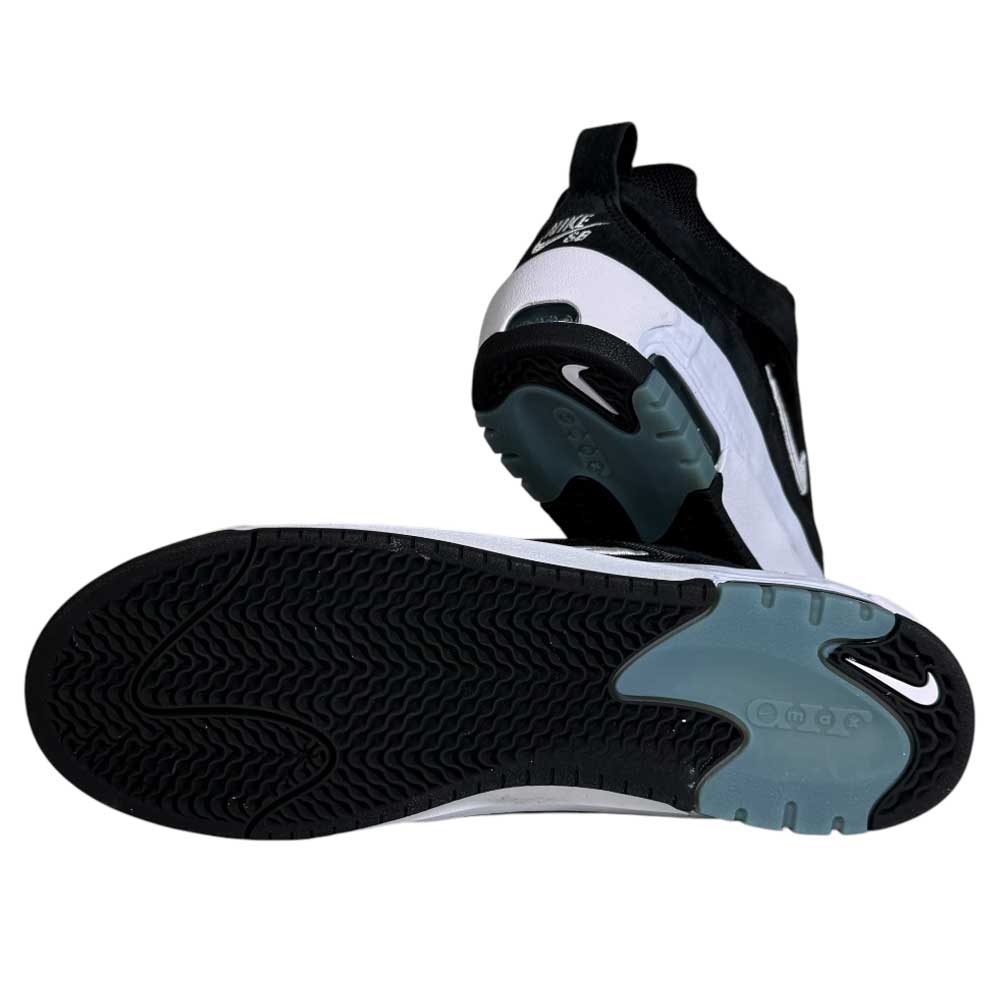 The FB2393-004 White Black Air Max Ishod Wair Leather Suede Shoes are displayed: one shows the sole, the other highlights the heel and side. Skate-inspired, they feature a wavy tread, a small Nike Swoosh, and Max Air tech for comfort.