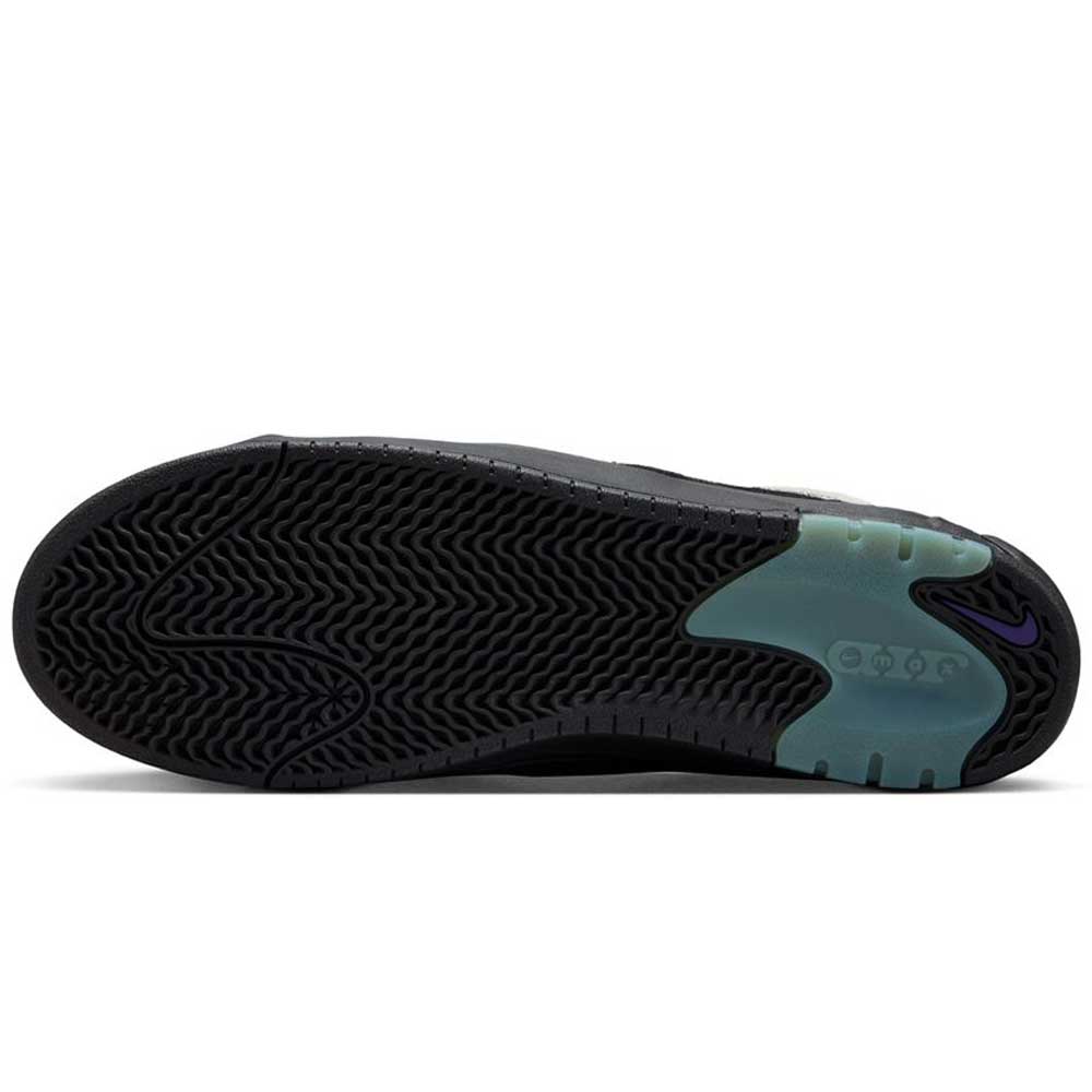 The image shows the sole of a White Black Court Purple Denim Air MAX Ishod Nike SB skate shoe with a textured herringbone pattern, translucent light blue heel, circular designs, and purple Nike swoosh—highlighting Max Air cushioning.