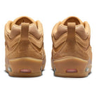Back view of FB2393200 Flax Brown Air MAX Ishod Nike SB skateboarding shoes, crafted in leather and suede with gum soles, visible air units, and embossed Nike logos on the heel.