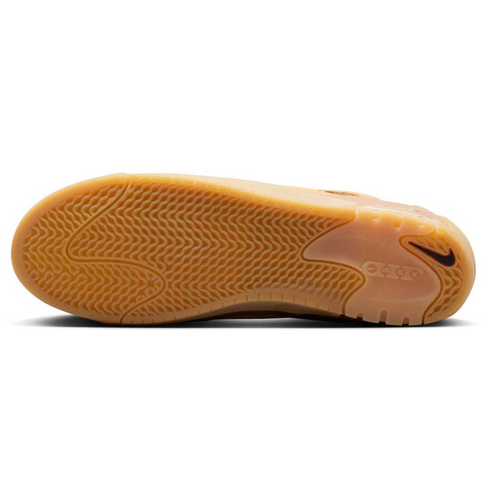 The image shows the gum-colored sole of the FB2393200 Flax Brown Air MAX Ishod Nike SB Leather & Suede Skateboarding Shoes, featuring a wavy traction pattern and a small Nike Swoosh logo near the heel, inspired by classic Nike SB designs.