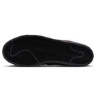 The image displays the black rubber outsole of the FD0731201 Baroque Brown Black Blazer Mid Nike SB Suede Skateboarding Shoe, featuring a herringbone traction pattern and a subtle outline of a leaping puma.