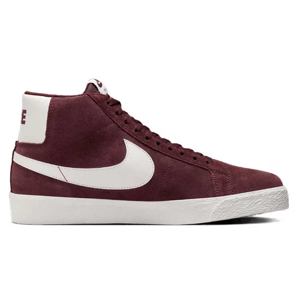The FD0731-600 Burgundy Crush/Summit White Blazer Mid Nike SB suede shoes are high-top sneakers with a white Swoosh, heel tab, and rubber sole, shown from the side against a plain background.
