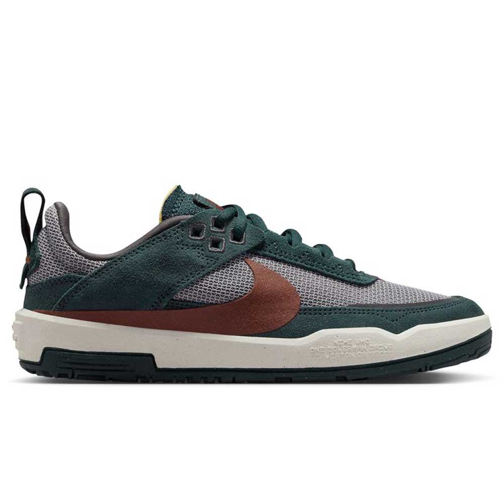 The FN4210-302 Seaweed/Red Sepia/Medium Ash YOUTH Day One GS Nike SB Shoes feature stylish mesh uppers, a brown Swoosh, white midsole, and dark outsole. Layered textures and Zoom Air deliver modern style and cushioned comfort for kids.