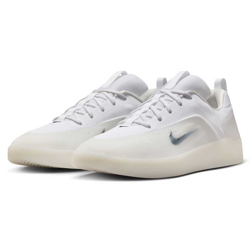 The FQ1273100 White Black Zoom Nyjah 4 Nike SB Skateboarding Shoes feature a sleek, minimalist design with white low-top uppers, white laces, translucent soles, a semi-transparent silver Swoosh, and responsive Air Zoom cushioning for all-day comfort.