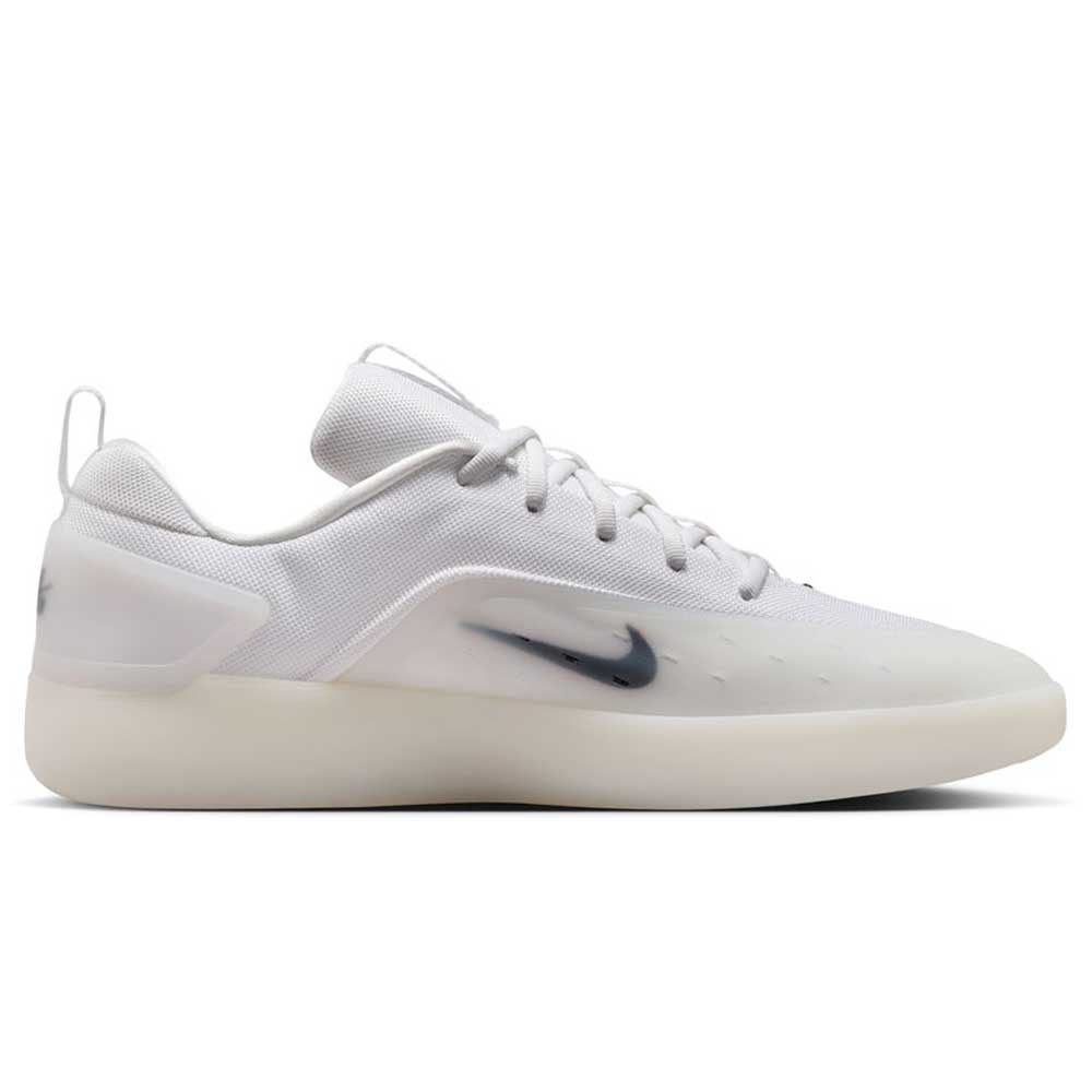 The FQ1273100 White Black Zoom Nyjah 4 Nike SB Skateboarding Shoes feature a minimalistic white low-top design, mesh upper, translucent HART outsole, black Nike swoosh, and are inspired by Nyjah's signature style.