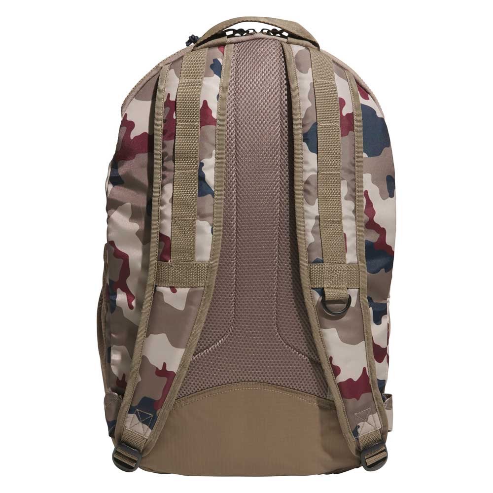 The FSBS Backpack KS6815 Khaki Camo by Adidas Skateboarding is shown from the back, featuring a camouflage pattern, padded shoulder straps, a top handle, ventilation mesh, and tan base and accents.