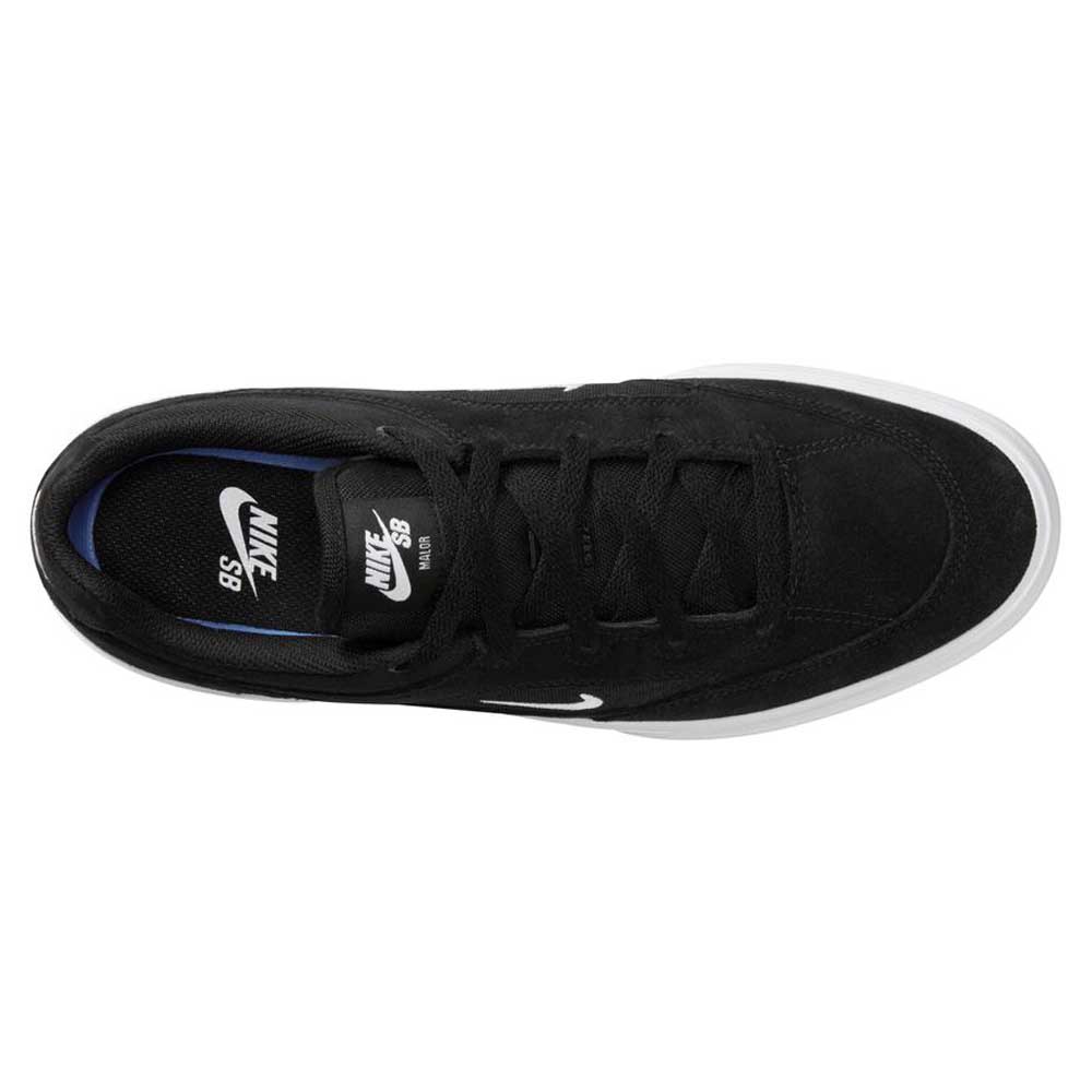Top view of FV6064001 Black White Malor Nike SB Suede Skateboarding Shoes: black suede upper, black laces, white sole, white Nike logo on tongue, and blue inner lining near the heel. Designed for skateboarding durability and style.