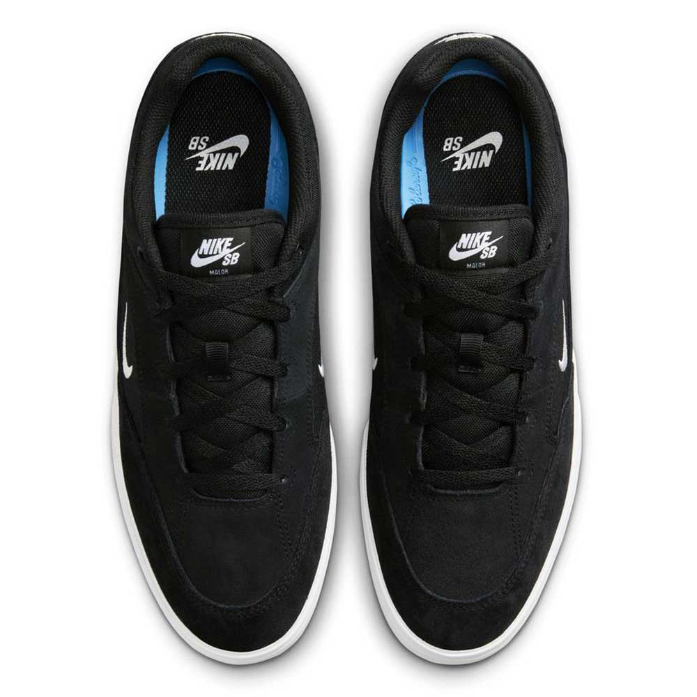 A top view of FV6064001 Black White Malor Nike SB Suede Skateboarding Shoes shows black uppers, white midsoles, blue insoles, and the Nike SB logo on each tongue. The suede finish is visible.