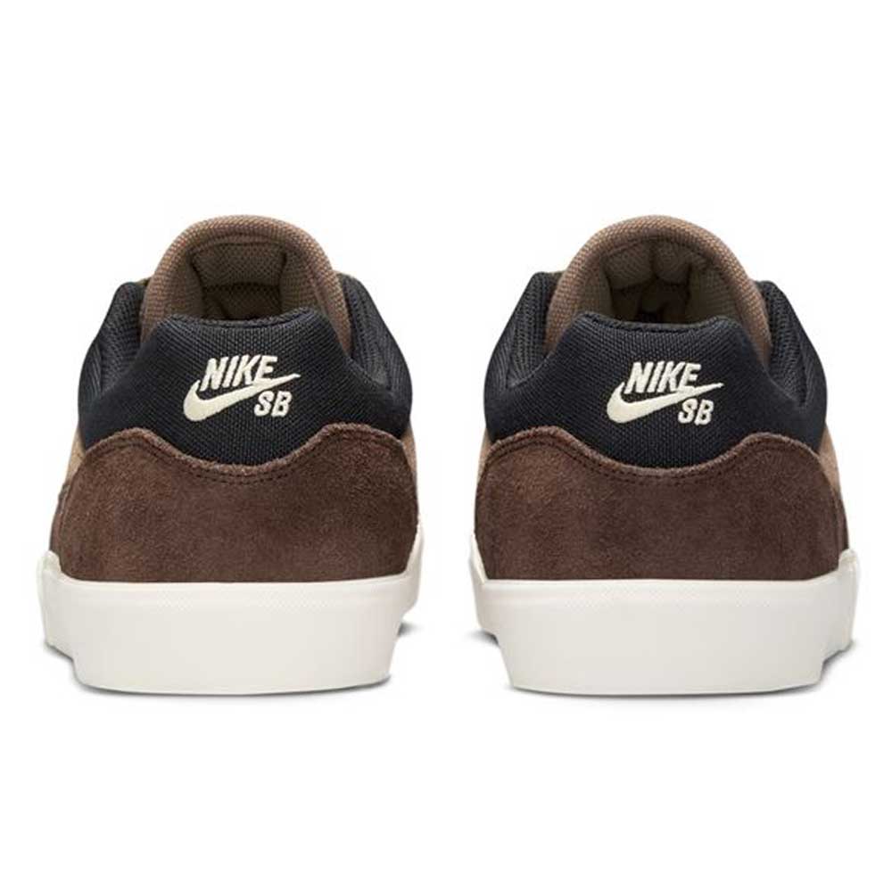 A pair of FV6064005 Ironstone Light Khaki Malor Nike SB suede skateboarding shoes shown from the back, featuring white Nike SB logos on the heels and white rubber soles—classic, timeless style.