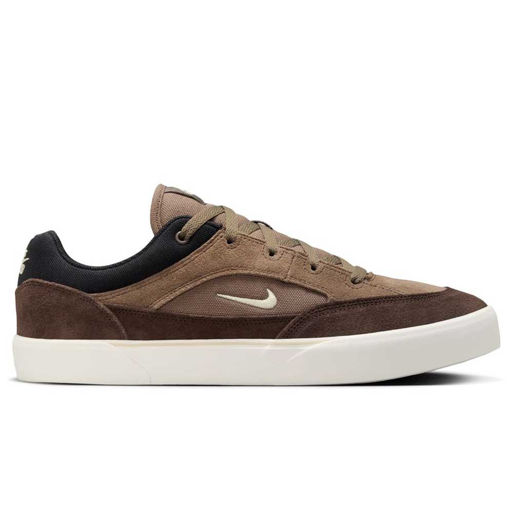 The FV6064005 Ironstone Light Khaki Malor Nike SB Suede Skateboarding Shoes feature a brown and tan low-top design with a white sole, black collar, and side Nike swoosh—ideal for skateboarding shoes enthusiasts.