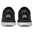 Rear view of FV8493003 Black White PS8 Nike SB Leather Knit Shoes with white soles, HART outsole, and embroidered white Nike SB logo on the heels.