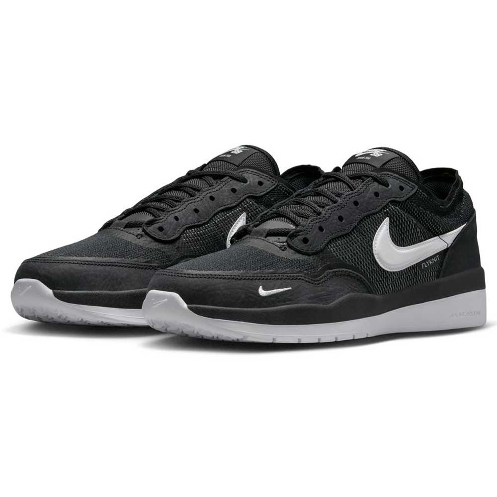 The FV8493003 Black White PS8 Nike SB Leather Knit Shoes feature a black and white design with mesh and suede upper materials, gray HART outsoles, and white swoosh logos, displayed against a white background.