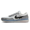 Side view of FV8493-004 Grey White PS8 Nike SB Leather Knit Shoes, featuring a black swoosh, textured gray detailing, translucent light blue sole, FLYKNIT branding by the swoosh, and Air Zoom cushioning.
