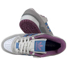 The Forum 84 Low Adidas Skateboarding Gray Lavender Ice Blue Leather Shoes feature grey uppers with white, blue, and purple accents. One sneaker is shown side/sole view; the other from above reveals a purple lining and Adidas logo on the tongue.