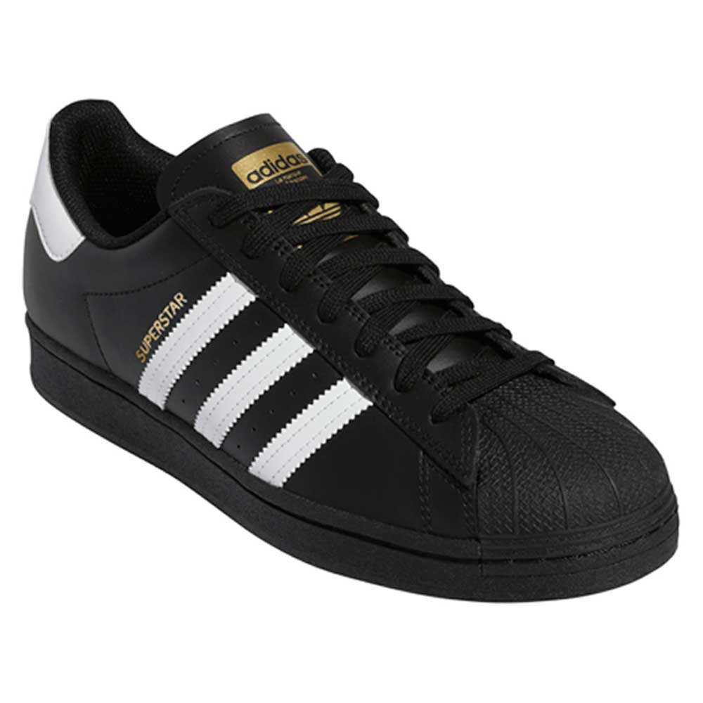 The GW6931 Black White Superstar ADV Adidas Skateboarding Leather Shoes feature a shell toe, white side stripes, gold Superstar branding, gold adidas tongue logo, and a white heel accent—ideal for classic skate style fans.