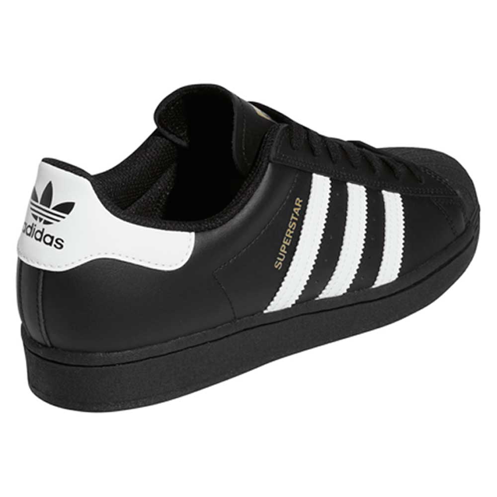 The GW6931 Black White Superstar ADV Adidas Skateboarding Leather Shoes feature a black leather upper, white stripes, white heel tab with the Adidas logo, "SUPERSTAR" in gold beside the stripes, black sole, and black laces.