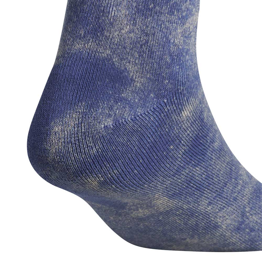 Close-up of a heel in the Gonz Art Sock KS6804 Adidas Skateboarding 1 Pair, a blue sock with a subtle faded tie-dye design. Set against a white background, this unique style stands out from Adidas Skateboarding.
