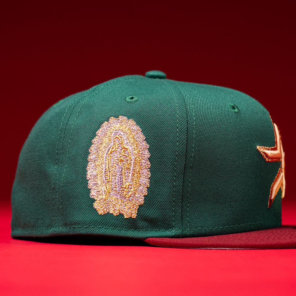 Celebrate Mexican culture in style with the La Virgencita Green Red Gold New Era Houston Astros Hat 5950 Fitted—featuring a gold and pink embroidered religious figure on the side, a gold-outlined star on the front, and vibrant green and red colors for a unique Virgen-inspired look.