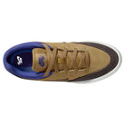 Top view of the Nike SB Malor GS (HF1205700) youth skate shoe in Wheat Velvet Brown/Deep Night, featuring a purple inner lining, brown laces, dark brown toe, white sole, and visible Nike logos—ideal for durable kids’ skate style.