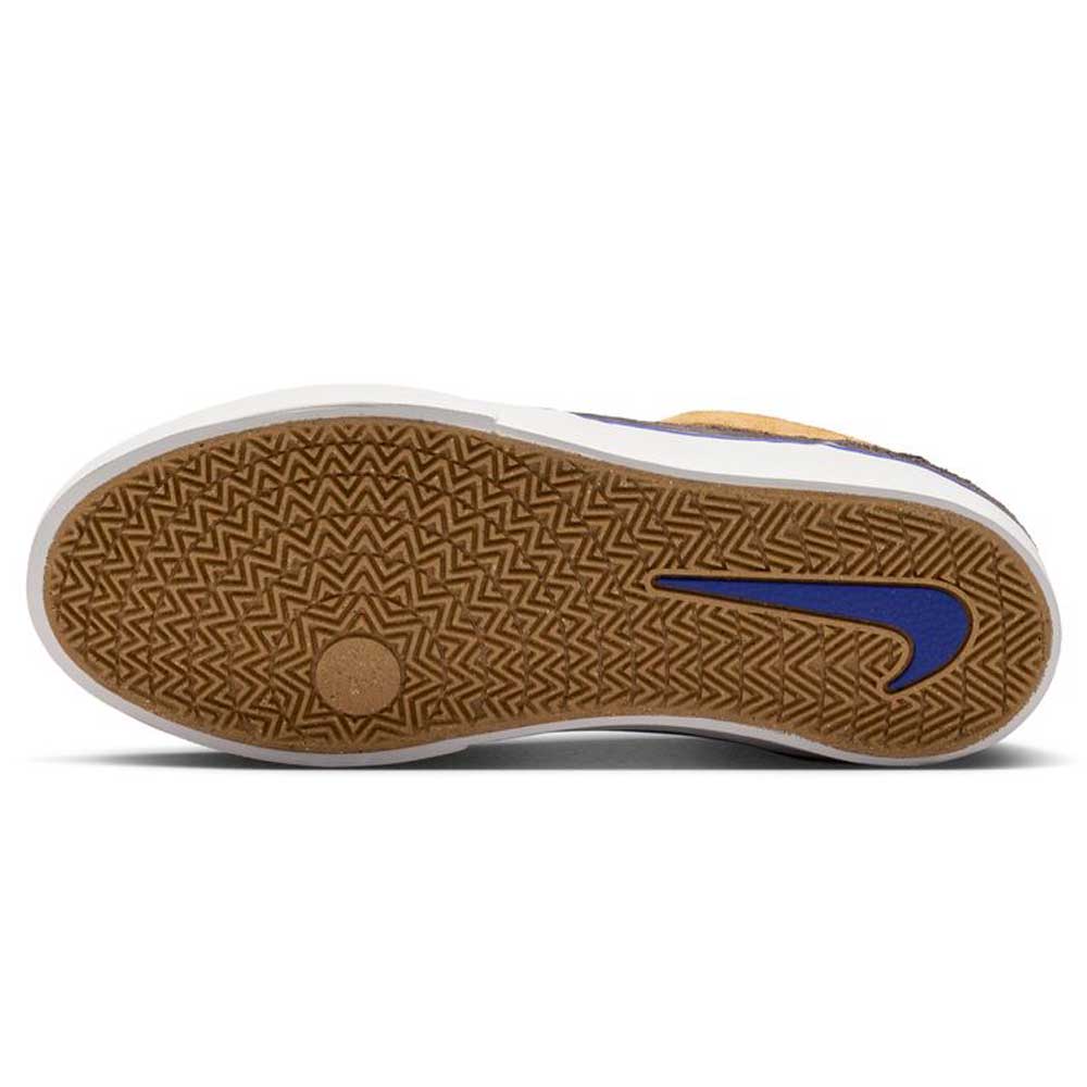 The Nike SB Malor GS (HF1205700 Wheat Velvet Brown Deep Night YOUTH) has a brown herringbone outsole with a circular grip at the toe, a blue Swoosh on the side, and a white midsole for durable skate performance.