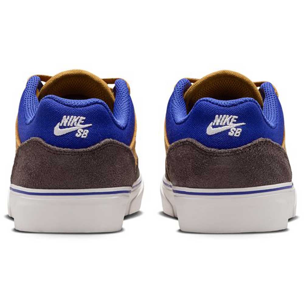 Back view of two HF1205700 Wheat Velvet Brown Deep Night YOUTH Malor GS Nike SB shoes featuring brown suede heels, blue mesh at the ankle, yellow lining, white rubber soles, and white Nike SB logos on the back.