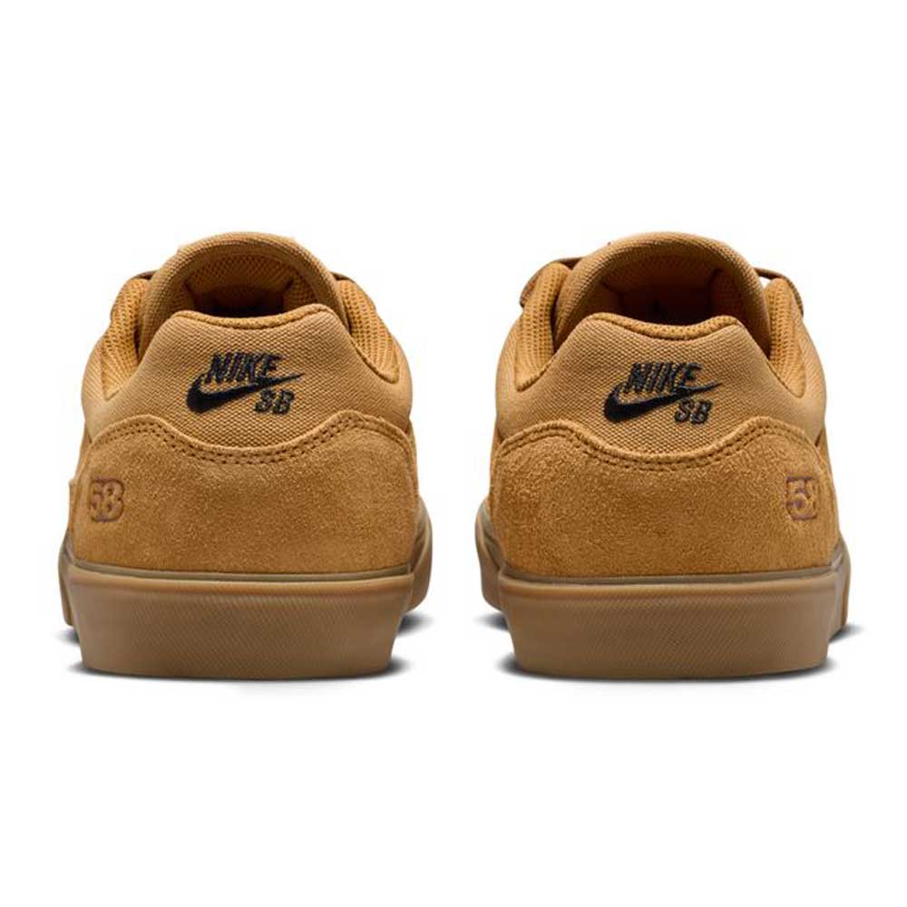 Two Wheat Gum Light Brown Black White Malor TE Nike SB shoes (HF3066701) are shown from the back, featuring the black Nike SB logo on the heels and “58” stitched above the soles to highlight their durable skate shoe design.