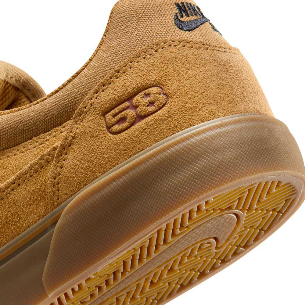 Close-up of the heel of the Nike SB Malor TE (HF3066701) in Wheat Gum Light Brown Black White, a men's skate shoe with "58" embroidered in orange and brown, a black Nike logo, and a textured gum rubber sole.