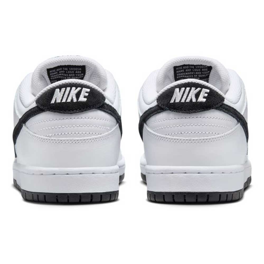 The HF3704100 White Black Nike SB Dunk Low Pro Suede Leather Shoe features a low-cut design, black detailing, black outsoles, and bold white NIKE logos on the black heel tabs—perfect for skateboarding in style.