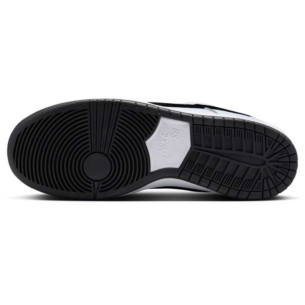 The image displays the black and gray sole of the HF3704100 White Black Nike SB Dunk Low Pro Suede Leather Shoe, viewed from below, with a circular tread pattern and the NIKE SB logo embossed at the center.