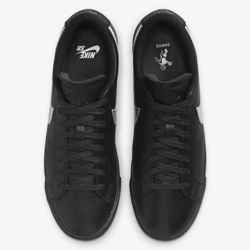 Top view of HJ6703001 Black White Silver Blazer Low Dancer Nike SB leather skateboarding shoes; features white Swoosh logos, black laces, and insoles with white Nike logos plus a cartoon hand and “DANKCA” text on the right.