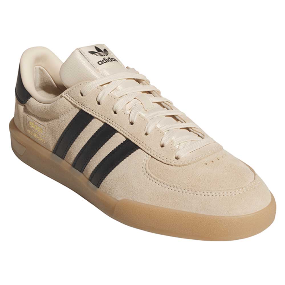 The HP3510 Tan Black Glenburn Adidas Skateboarding Suede Shoes feature a beige suede upper, black stripes, gold branding, cream laces, a gum sole, and the classic Adidas logo on the tongue for streetwear style.