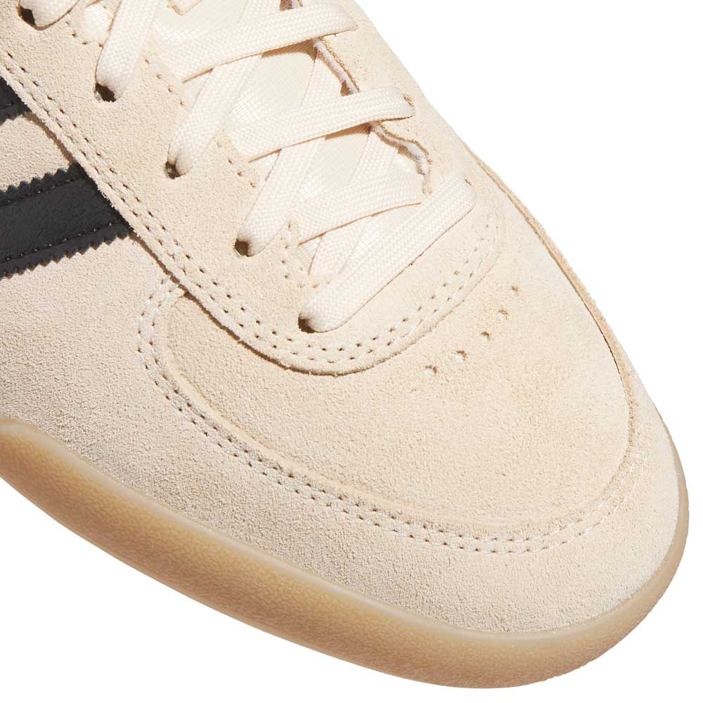 Close-up of the HP3510 Tan Black Glenburn Adidas Skateboarding Suede Shoes, featuring beige suede, cream laces, a black stripe detail, and textured stitching—ideal for streetwear or classic skate style.