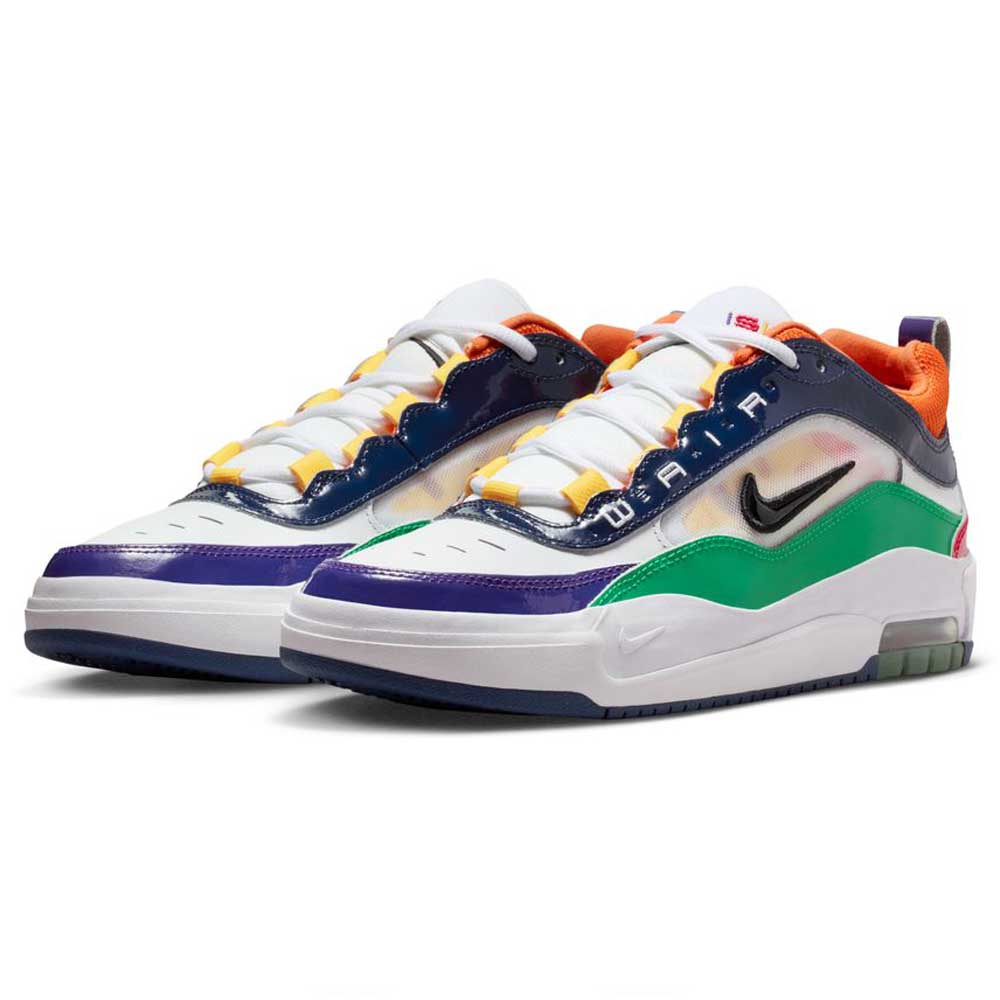 A pair of Nike SB Air Max Ishod skate shoes in University Red, Black, Amarillo, and Navy suede/leather with a black Nike swoosh, shown against a white background.