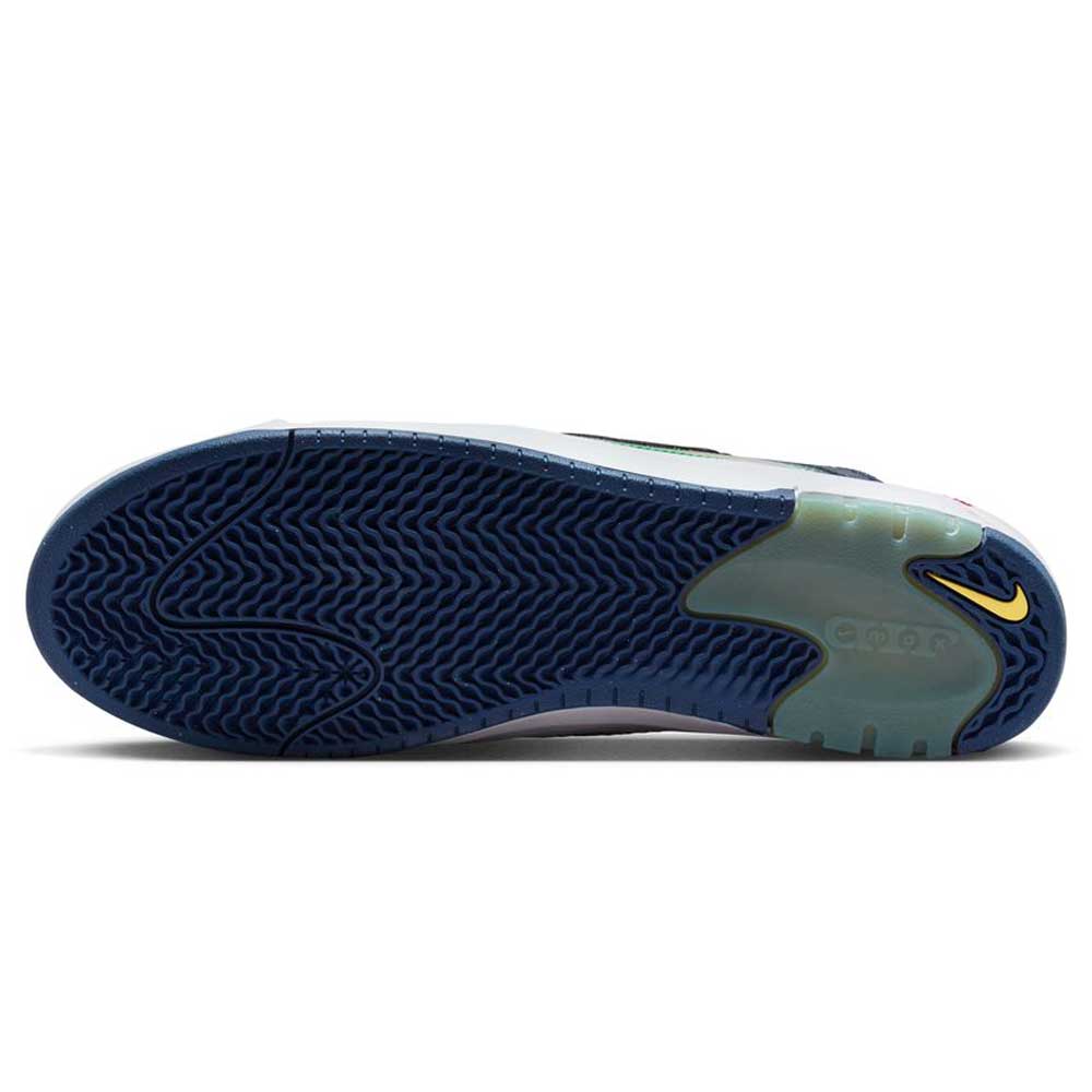 The image shows the bottom view of the HV1670600 University Red Black Amarillo Navy Air MAX Ishod Nike SB Suede Leather Skateboarding Shoe with a textured navy rubber outsole, light blue details, a yellow Swoosh, and a translucent heel revealing Max Air cushioning.