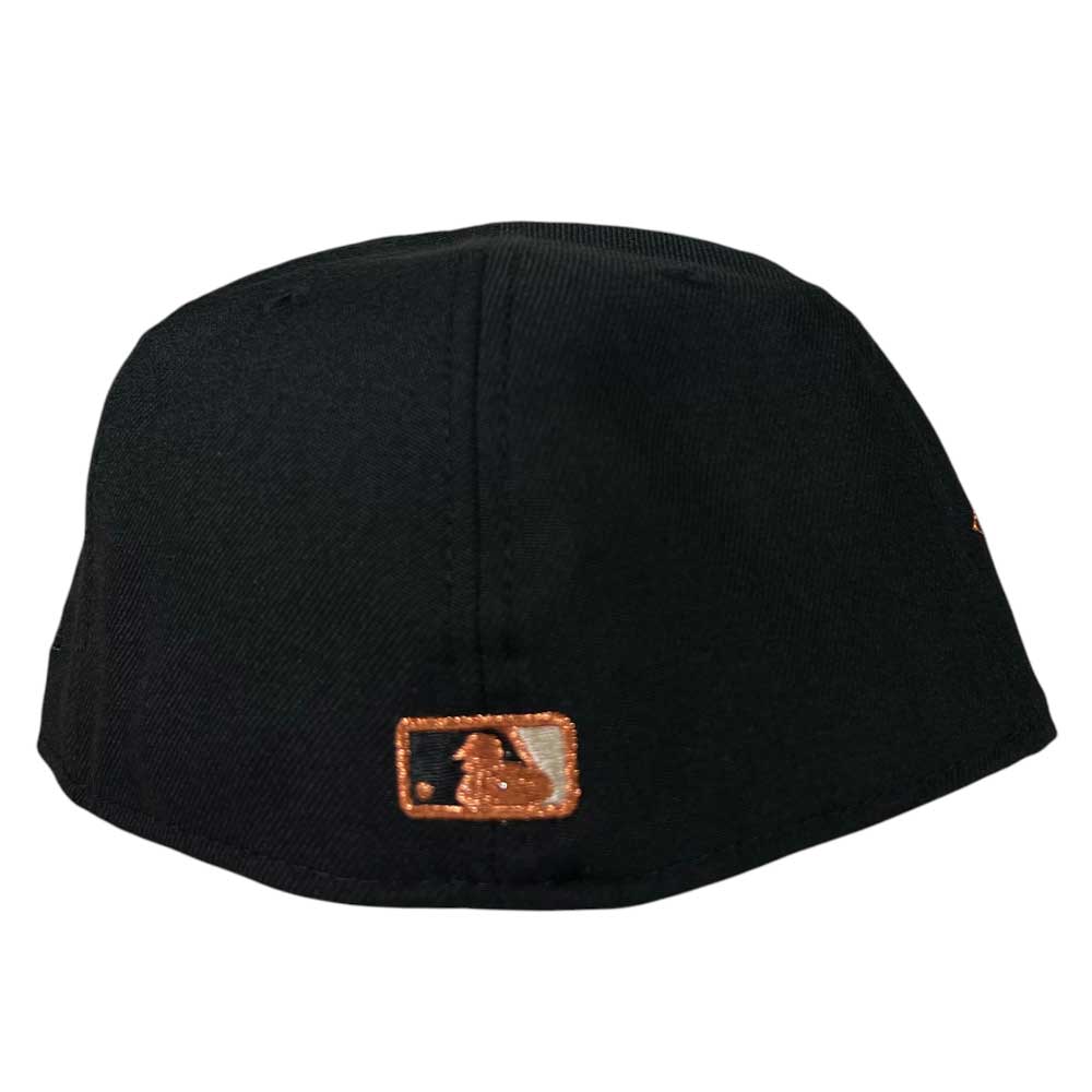 The Harvest Black Space City Houston Astros New Era 5950 Fitted by Whatafitted features a sleek black design with a small brown and white embroidered logo on the back, subtly showcasing Astros style.