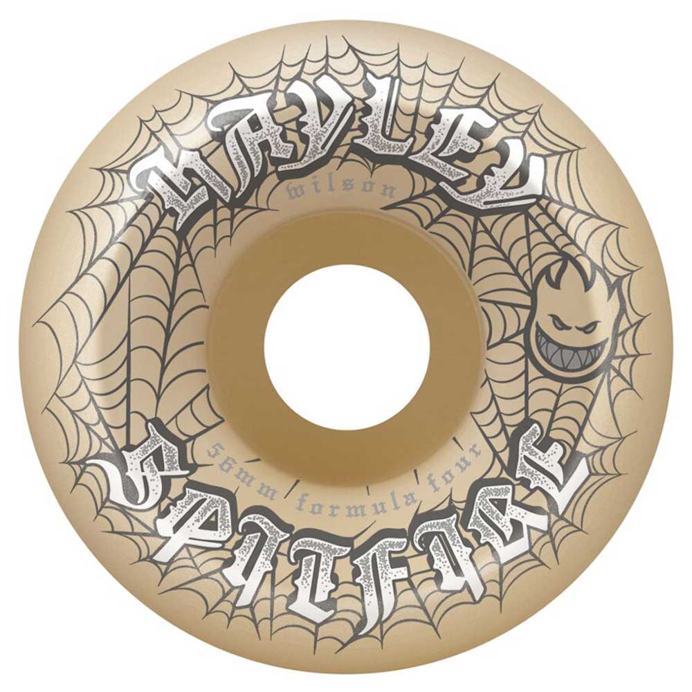 The Hayley Webbed 56mm99A Conical Full Spitfire Wheels are tan with black spiderwebs, gothic Hayley and Spitfire text, a grinning flame-head logo, and "Formula Four" in small lettering.