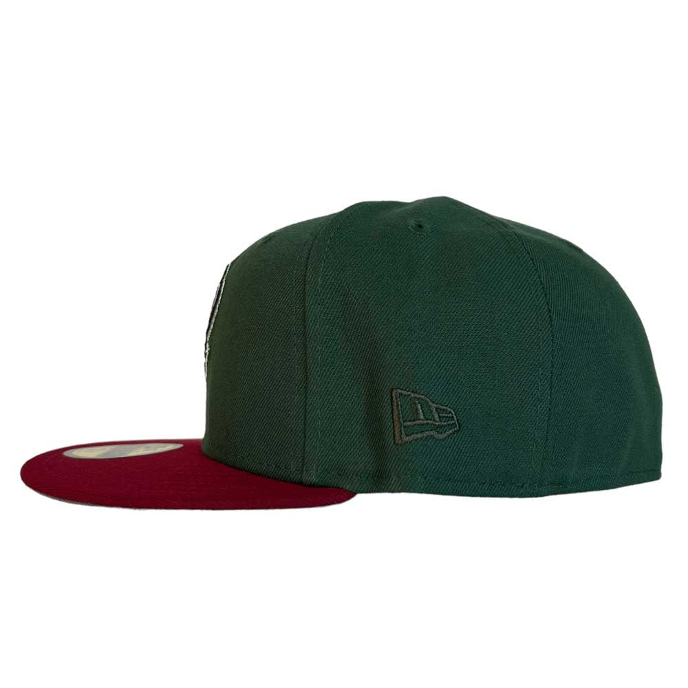 A green El Sarape Sugar Land Space Cowboys New Era Hat 5950 Day with a flat burgundy brim. The Whatafitted style and New Era logo are embroidered on the side.