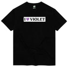The I Love Violet Black Tee from Violet Skateboards is a 100% cotton black shirt with a "I ♥ VIOLET" screenprint and a purple heart inside a white rectangle on the chest.