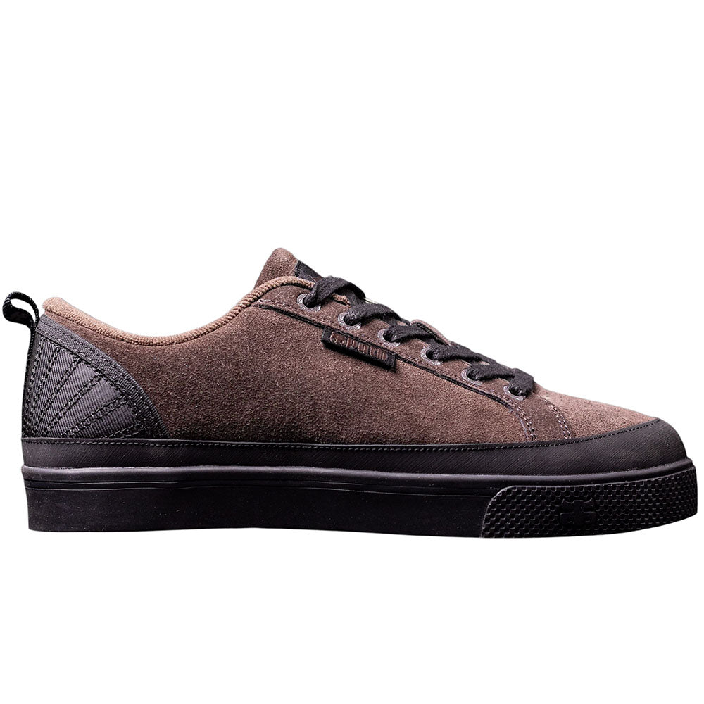 The Taylor Brown Suede Black I Path Shoes Skateboarding features a brown suede upper with black laces, black trim on the heel and sole, and a classic low-top silhouette. The sneaker is displayed from the side against a white background.