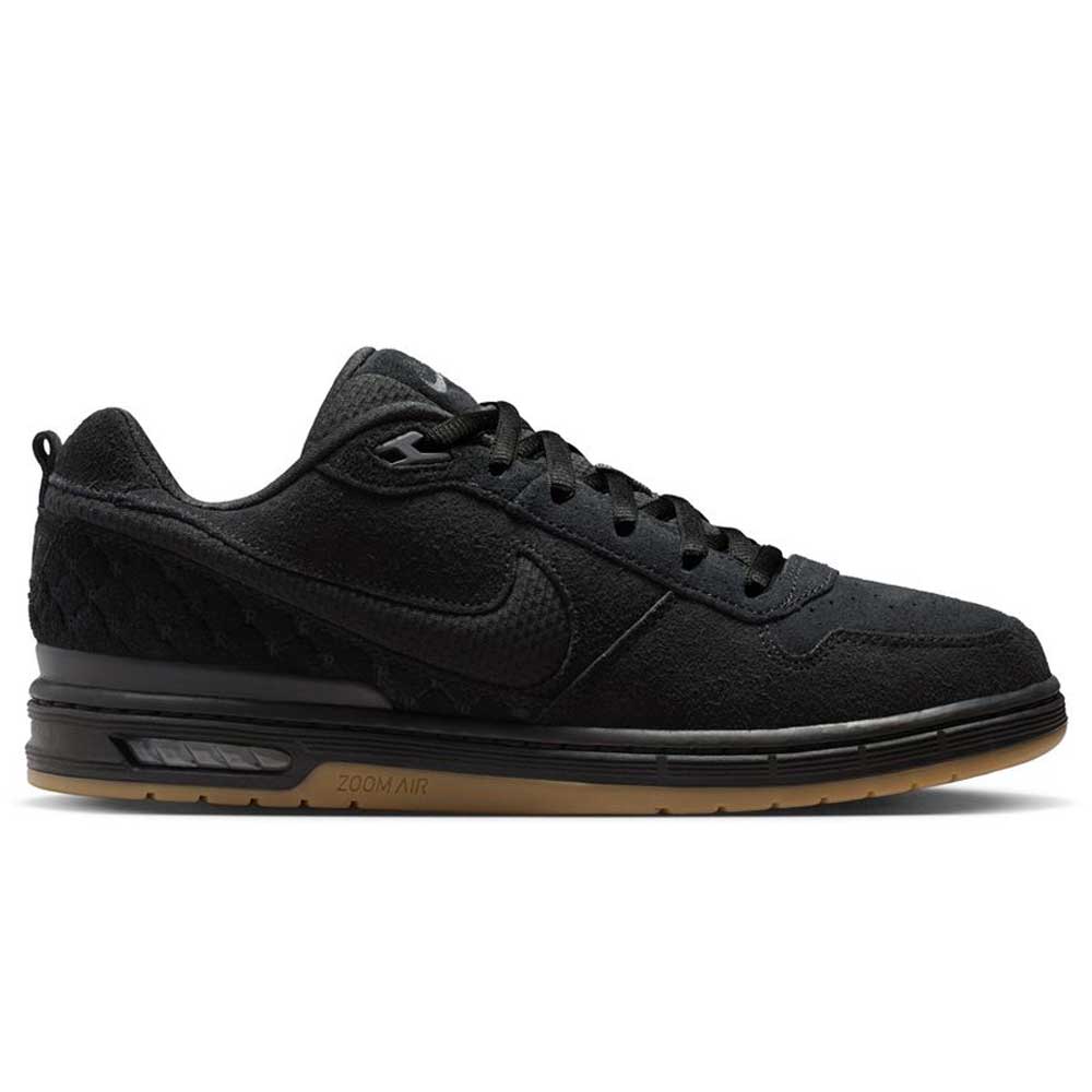 The IQ6827001 Black Gum Light Brown Paul Rodriguez Zoom Air Low features black suede, black laces, a subtle black swoosh, gum-colored sole, Zoom Air branding on the midsole, and responsive Air Zoom cushioning for comfort.