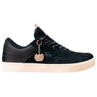 The Poet Black Suede Ballistic Nylon I Path Skateboarding Shoe features a black upper, white sole, black laces, a metal cartoon face charm on the side, durable ballistic nylon with a textured finish, and a small logo near the laces.