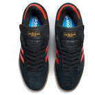 Top view of JH8134 Black Orange Gum Busenitz Adidas Skateboarding Suede Shoes with orange stripes, gold Adidas branding on the tongue, and blue insoles, placed side by side on a white background.