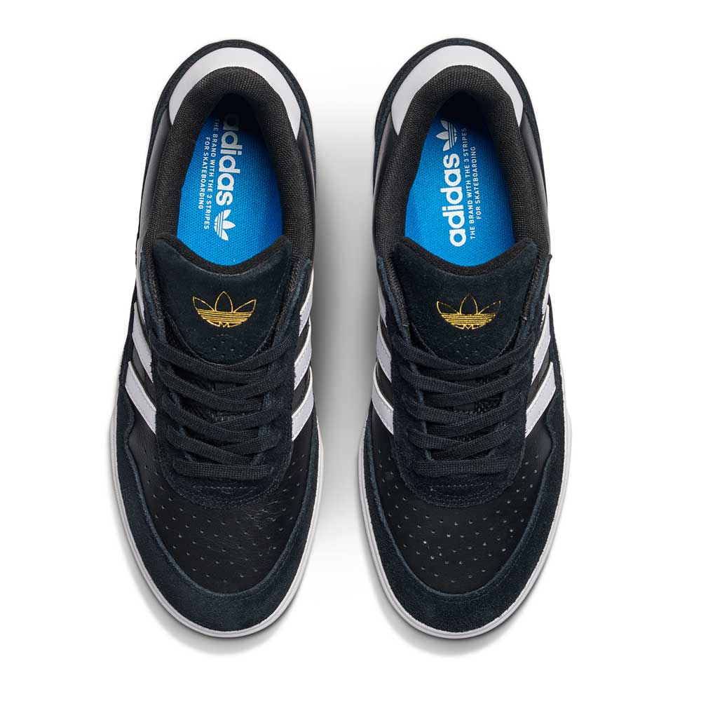 A pair of JI 0846 Black White Gum Tyshawn 2 II Adidas Skateboarding Leather Suede Shoes, seen from above. They feature white stripes, blue insoles with the Adidas logo, and tongues with a gold Adidas trefoil logo.