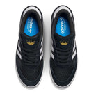 A pair of JI 0846 Black White Gum Tyshawn 2 II Adidas Skateboarding Leather Suede Shoes, seen from above. They feature white stripes, blue insoles with the Adidas logo, and tongues with a gold Adidas trefoil logo.