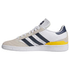 The JP8604 Brown Navy Busenitz Adidas Skateboarding Suede Shoes feature a suede toe, navy stripes and heel, yellow heel accent, textured white sole, and classic three stripes—taking inspiration from the original Busenitz ADV skate shoes.