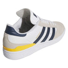 The JP8604 Brown Navy Busenitz Adidas Skateboarding Suede Shoes feature navy stripes, a navy heel detail, yellow side accent, and beige suede overlays. The gold BUSENITZ label appears next to the stripes.
