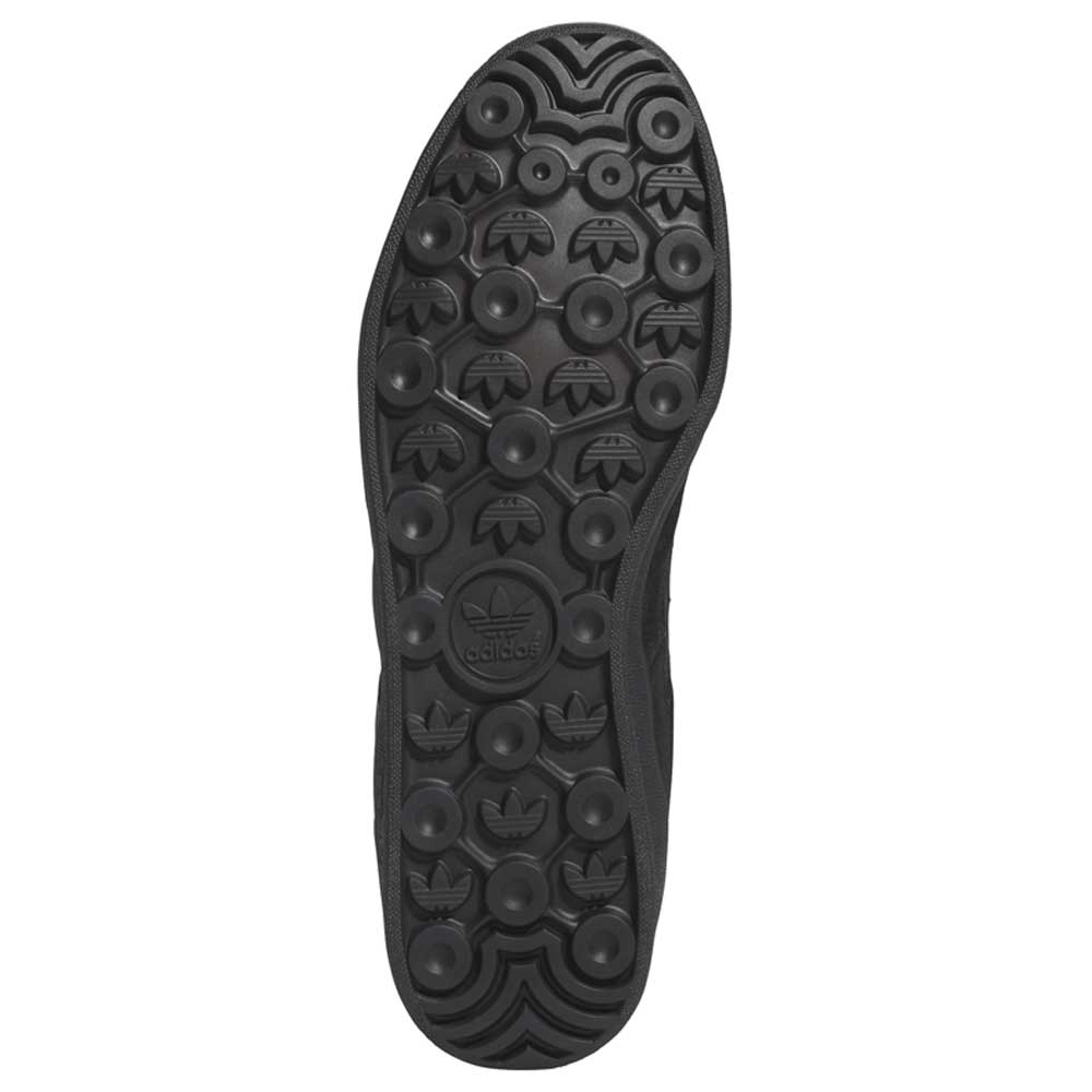 The JQ1042 Black Prete Aloha Super Suede Leather Skateboarding Shoes feature a black sole with circular tread patterns and multiple embossed Adidas Trefoil logos, providing excellent traction and board control.