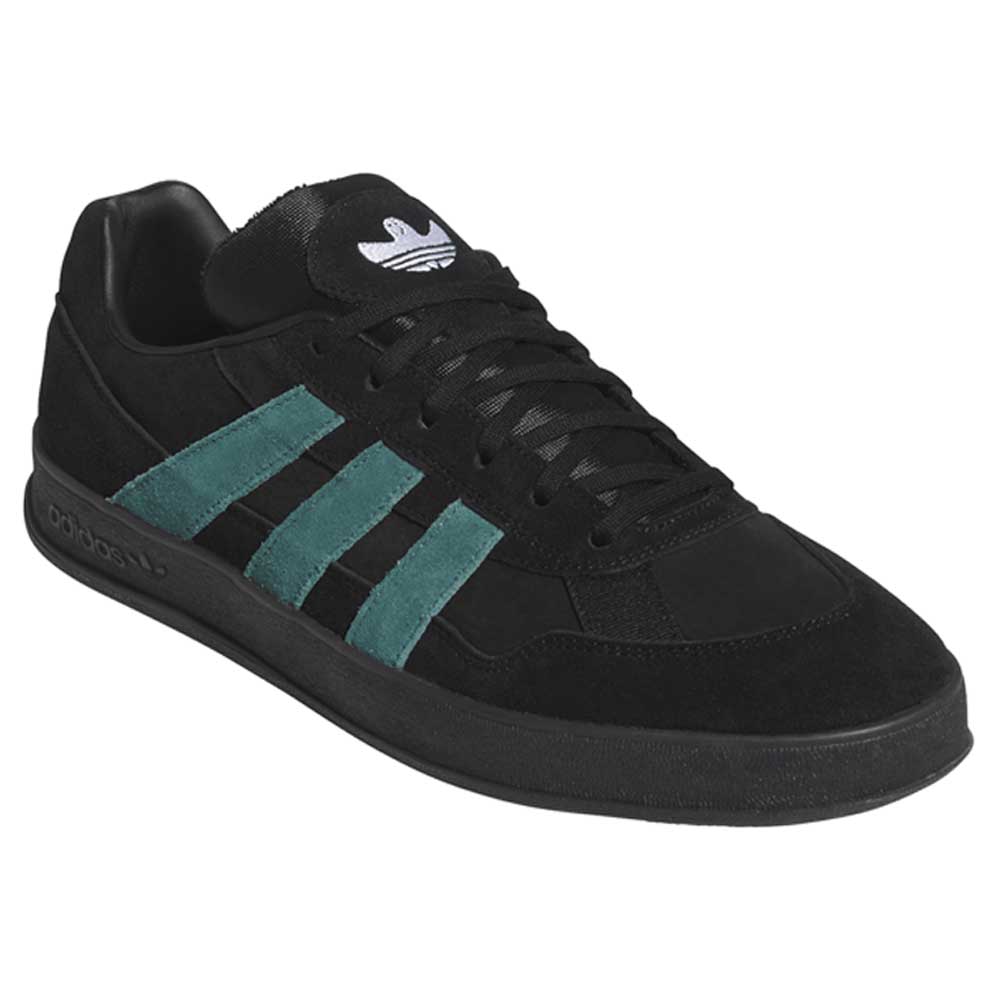 The JQ1042 Black Prete Aloha Super Suede Leather Skateboarding Shoes feature black suede, teal stripes, black laces, and a white logo on the tongue. Their low-top design and black sole provide style and board control for every session.