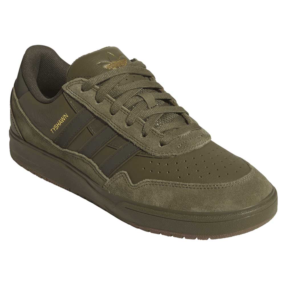 The JQ1132 Olive Strata Shadow Olive Tyshawn 2 II Adidas Skateboarding Shoes feature suede and premium leather panels, perforated toe box, stitched details, gold TYSHAWN text, Lightstrike midsole, and Adidas tongue logo.